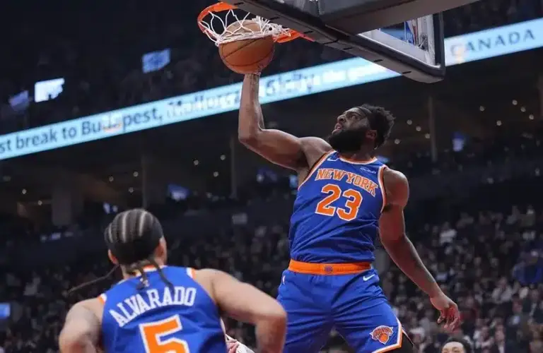 New York Knicks center Mitchell Robinson (23) shoots