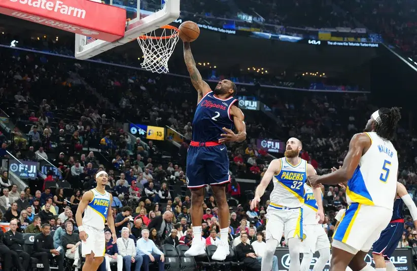 LA Clippers forward Kawhi Leonard (2) dunks the ball against the Indiana Pacers in the first half.