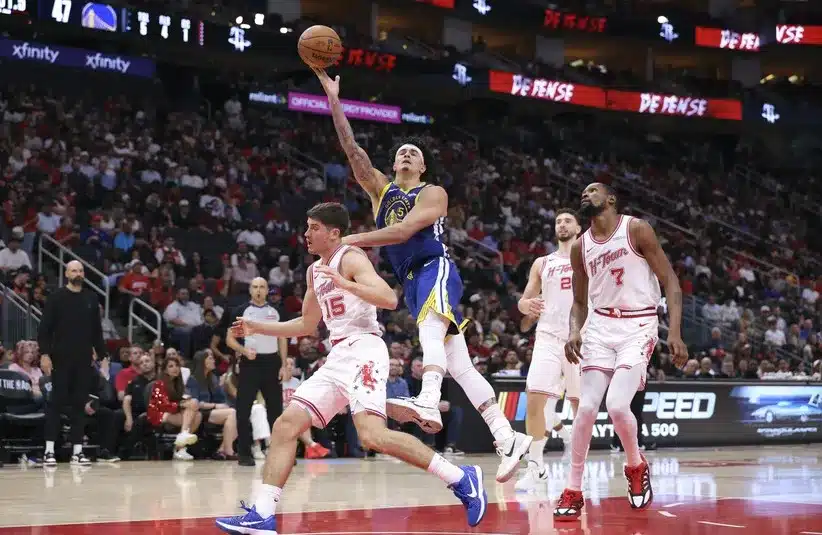 Golden State Warriors forward Gui Santos (15) shoots the ball