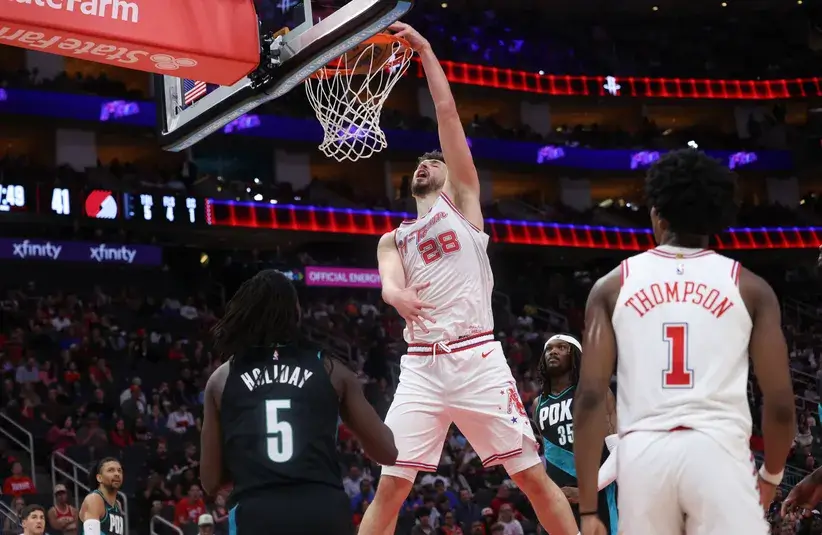 Houston Rockets center Alperen Sengun (28) dunks against Portland Trail Blazers guard Jrue Holiday (5) in the first half. Rockets Head Coach Ime Udoka