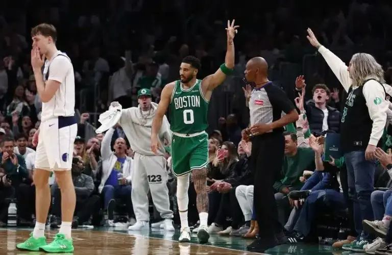 Boston Celtics forward Jayson Tatum (0) celebrates