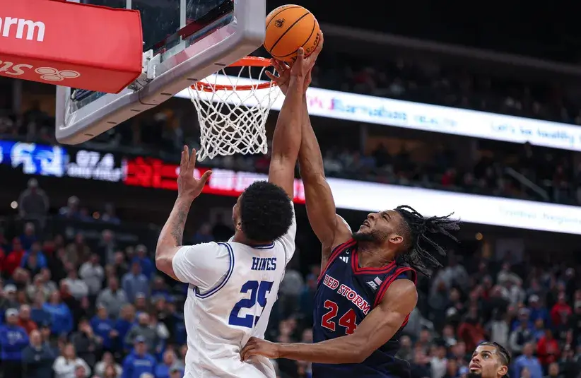 St. John's Red Storm forward Zuby Ejiofor (24) blocks a shot by Seton Hall Pirates center Najai Hines (25) during the second half.