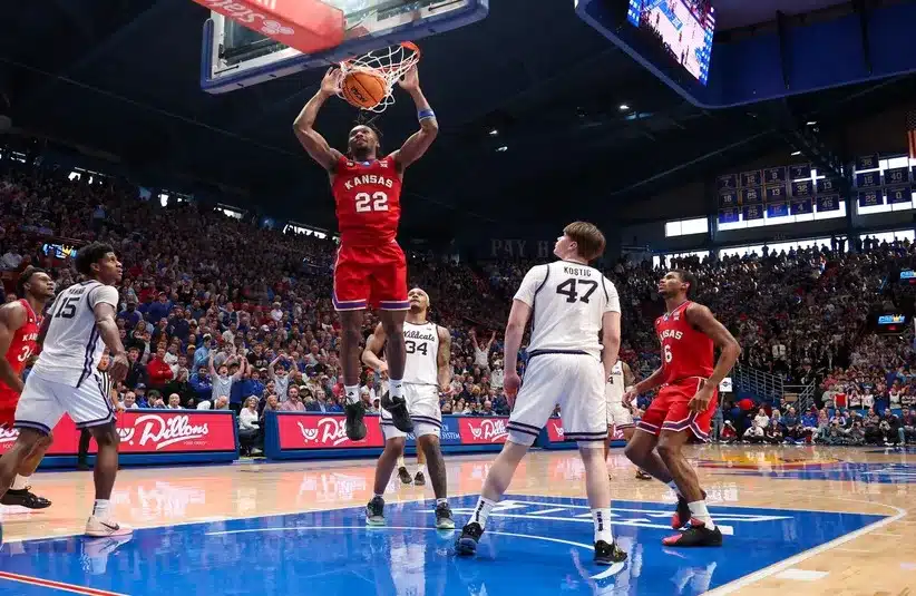 Kansas Jayhawks guard Darryn Peterson (22) dunks against Kansas State