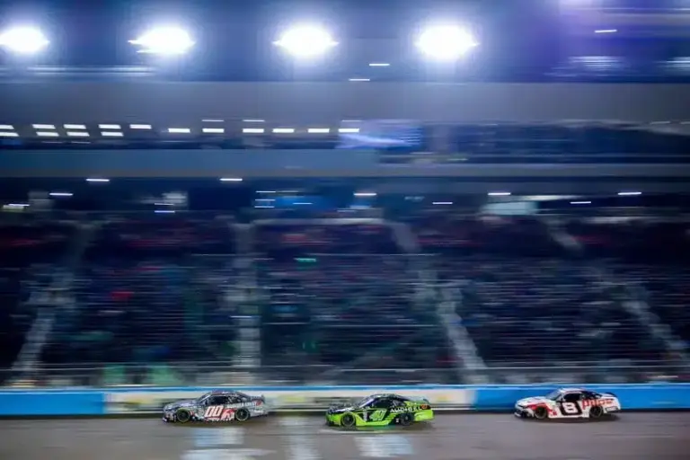 Gray; Mar 7, 2026; Avondale, Arizona, USA; Haas Factory Team driver Sheldon Creed (00) leads Haas Factory Team driver Sam Mayer (41) and JR Motorsports driver Sammy Smith (8) during the GOVX 200 at Phoenix Raceway.