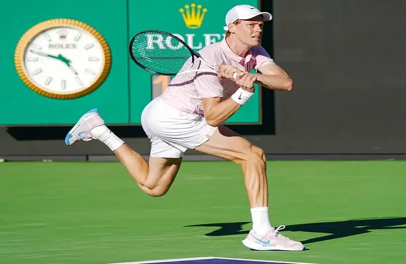 Sinner hitting a backhand
