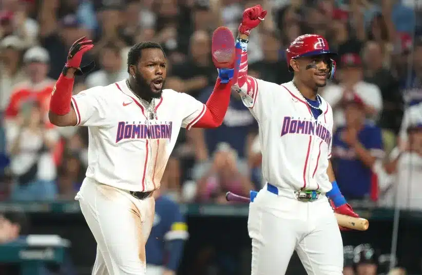 Dominican Republic first baseman Vladimir Guerrero Jr., left, and center fielder Julio Rodríguez celebrate