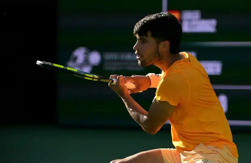 Alcaraz hitting a backhand