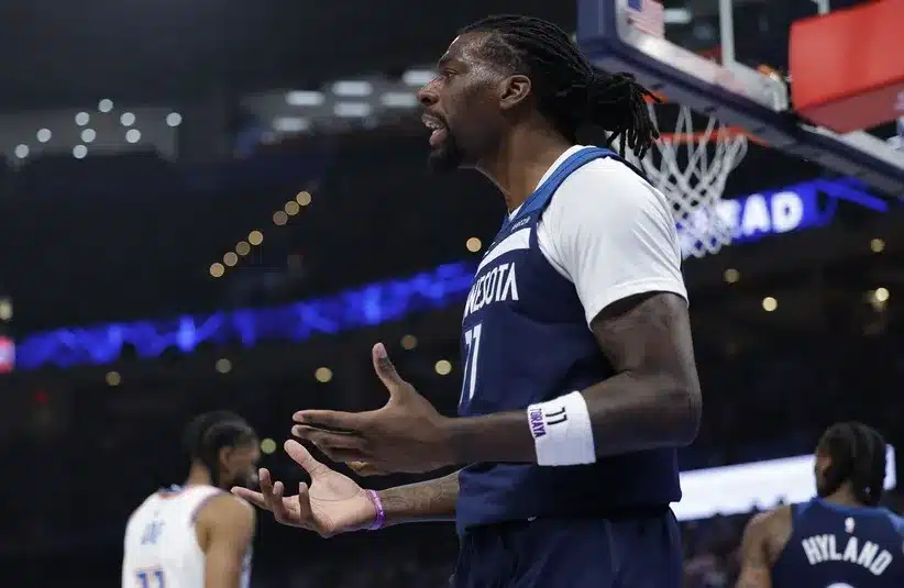 Minnesota Timberwolves center/forward Naz Reid (11) reacts