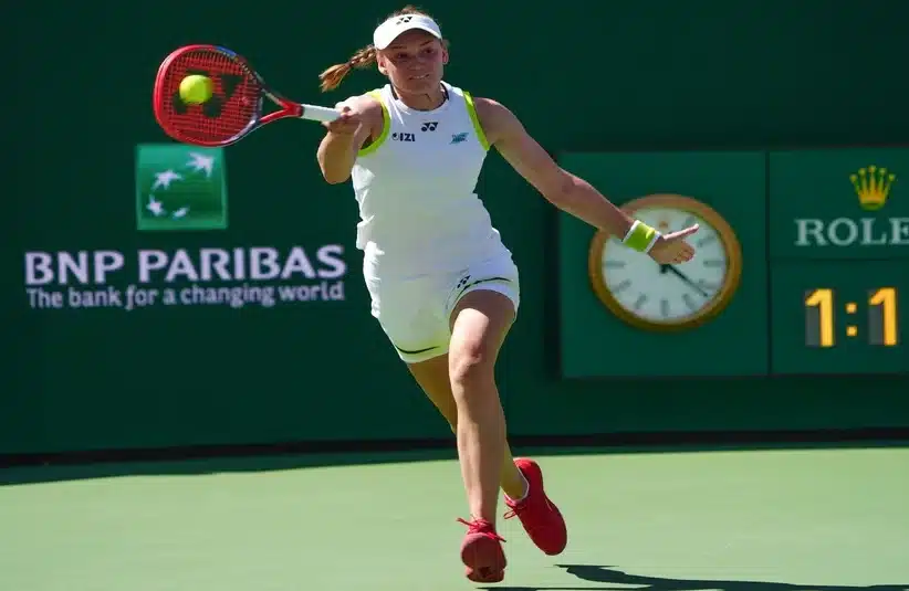 Rybakina hitting a forehand