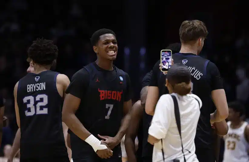 Howard Bison forward Julian Johnson (7) celebrates after defeating the UMBC Retrievers