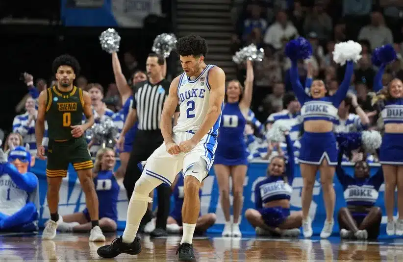 Duke Blue Devils guard Cayden Boozer (2) reacts against the Siena Saints