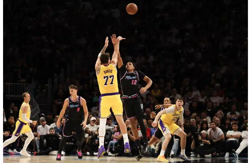 Luka Doncic shooting over the Heat in 60-point game on Thursday.
