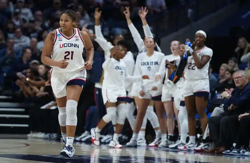 UConn Huskies forward Sarah Strong (21) returns up court after her three point basket.