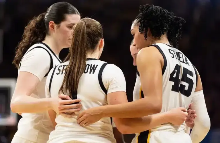 Iowa huddles in NCAA Tournament game against FDU.