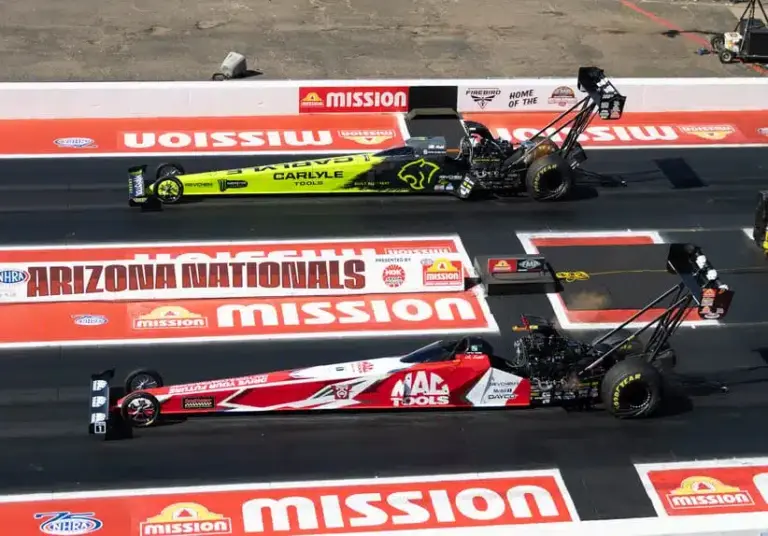 Mar 21, 2026; Chandler, AZ, USA; NHRA top fuel Driver Doug Kalitta (near) alongside Maddi Gordon during qualifying for the Arizona Nationals at Firebird Motorsports Park.