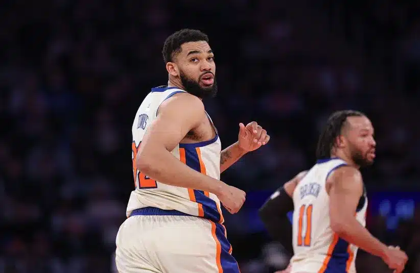 New York Knicks center Karl-Anthony Towns (32) runs up court.