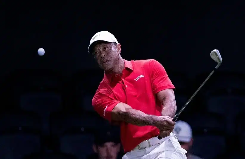 Tiger Woods hitting a shot.