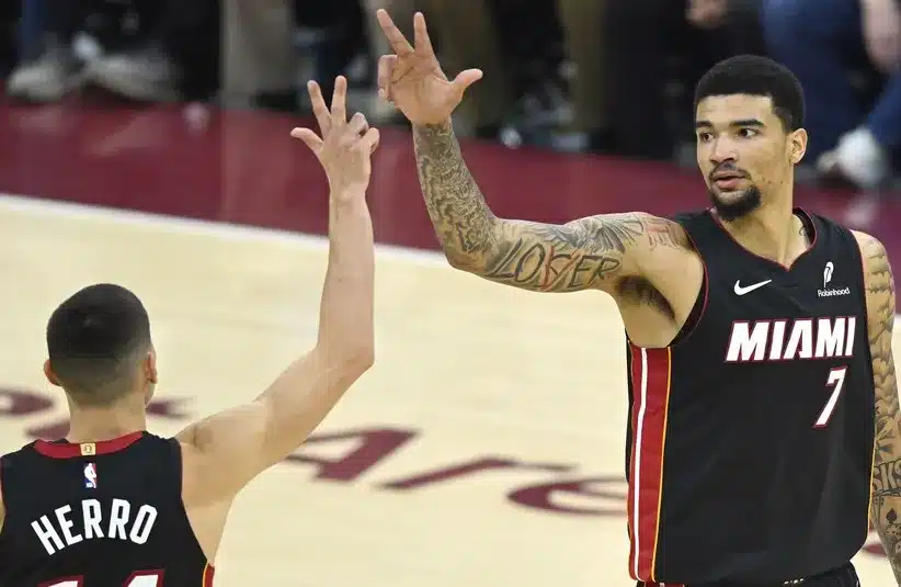 Miami Heat center Kel'el Ware (7) celebrates his three-point basket