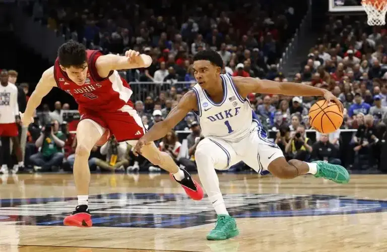Duke Blue Devils guard Caleb Foster (1) dribbles the ball