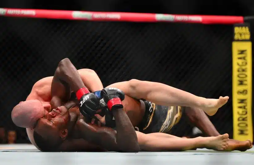 Israel Adesanya (red gloves) fights Joe Pyfer (blue gloves) during UFC Fight Night at Climate Pledge Arena