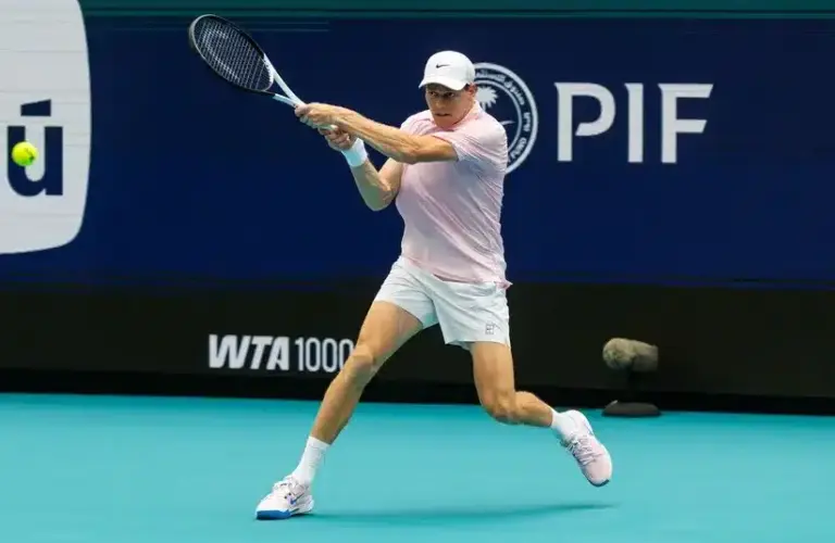 Jannik Sinner of Italy hits a backhand.