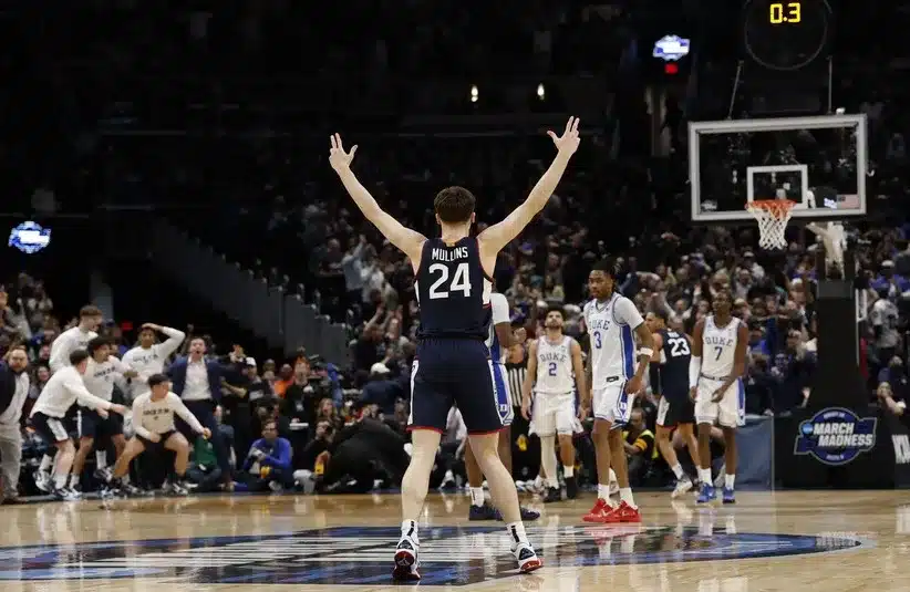 UConn Huskies guard Braylon Mullins (24) celebrates after making the game-winning three-point basket