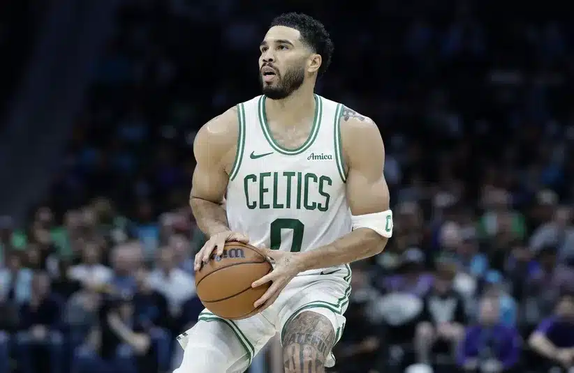 ; Boston Celtics forward/guard Jayson Tatum (0) prepares to attempt a jump shot