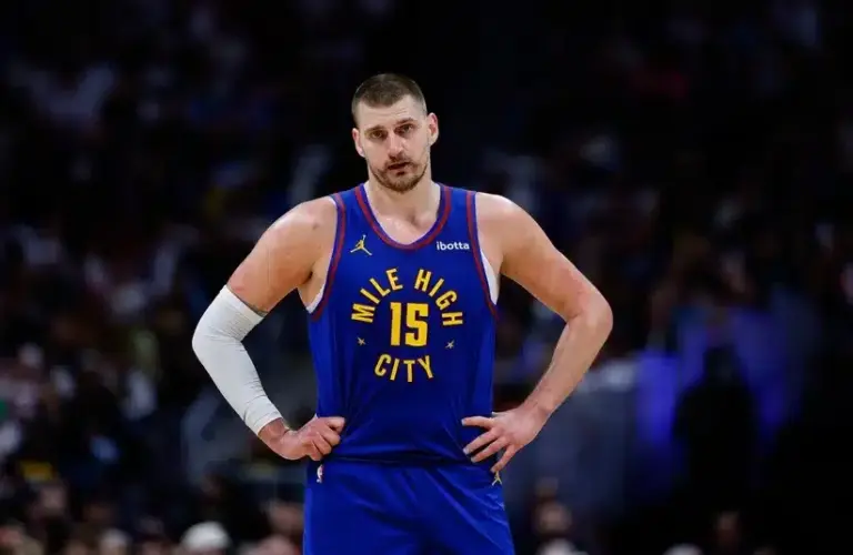 Nikola Jokic with hands on hips