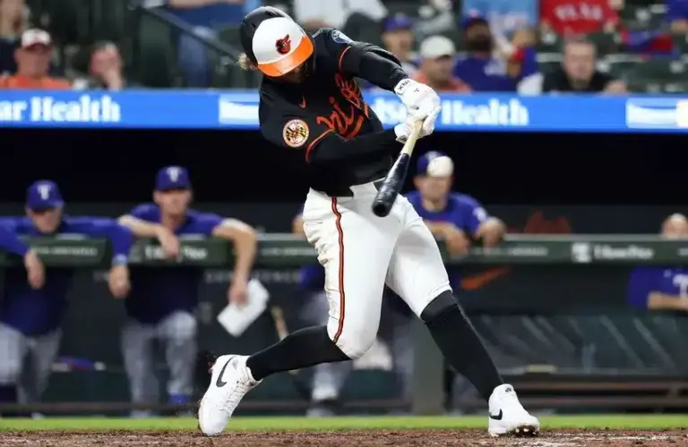 Baltimore Orioles left fielder Taylor Ward (3) hits a single.