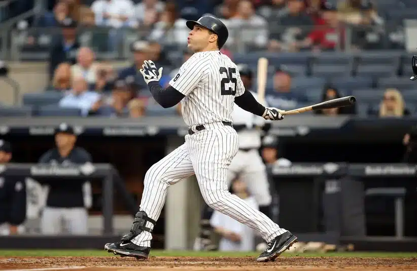 New York Yankees first baseman Mark Teixeira (25) takes a swing