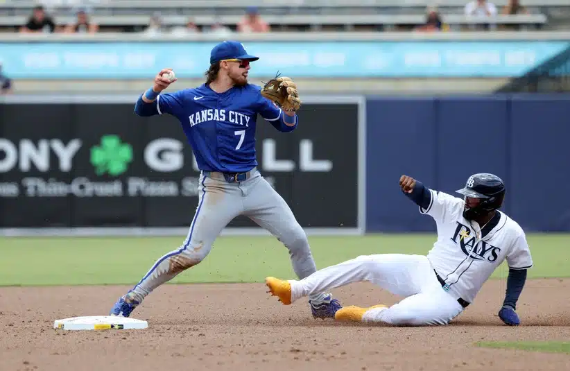 May 1, 2025; St. Petersburg, Florida, USA; Kansas City Royals shortstop Bobby Witt Jr. (7) forces out Tampa Bay Rays third base Junior Caminero (13) and throws the ball to first base during the second inning at George M. Steinbrenner Field.