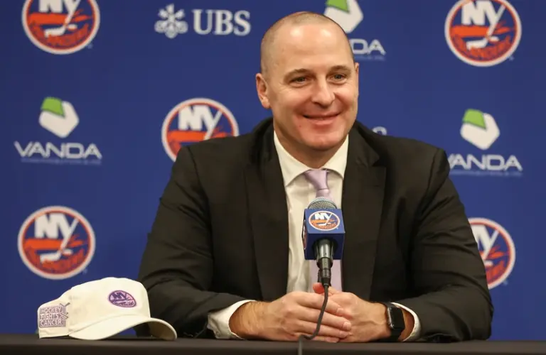 Nov 22, 2025; Elmont, New York, USA; New York Islanders General Manager Mathieu Darche speaks with fans at a pre-game event prior to the game against the St. Louis Blues at UBS Arena.
