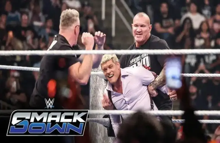 Pat McAffee and Randy Orton attacking Cody Rhodes on Smackdown.