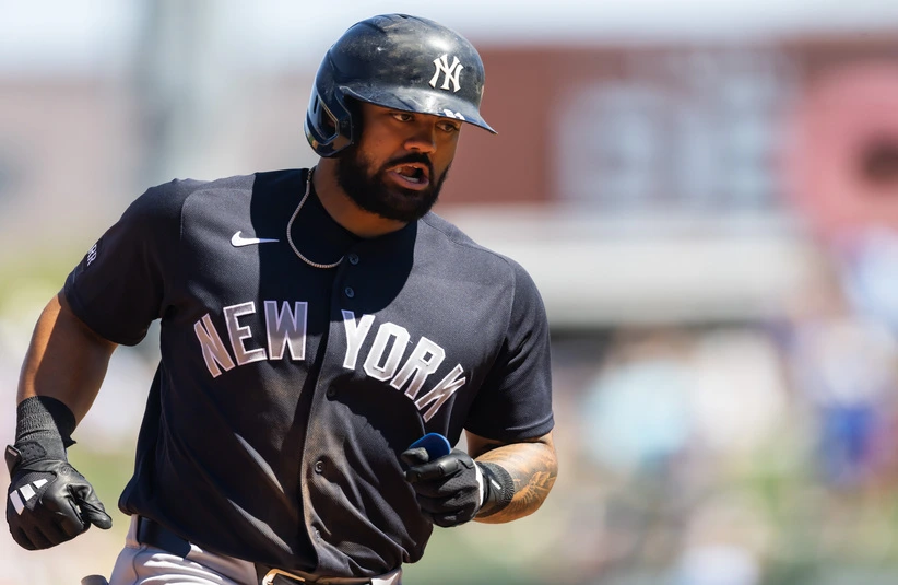 Mar 24, 2026; Mesa, Arizona, USA; New York Yankees outfielder Jasson Dominguez rounds the bases after hitting a home run against the Chicago Cubs during spring training at Sloan Park.
