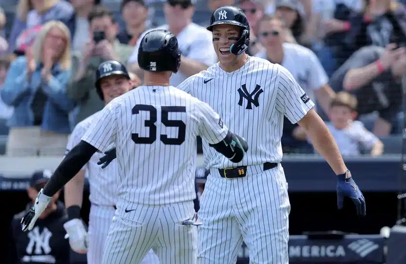 Apr 18, 2026; Bronx, New York, USA; New York Yankees center fielder Cody Bellinger (35) celebrates his two run home run against the Kansas City Royals with right fielder Aaron Judge (99) during the third inning at Yankee Stadium.