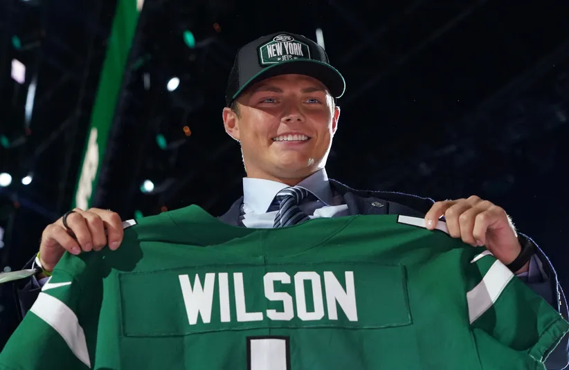BYU quarterback Zach Wilson poses with jersey after being selected as the second pick by the New York Jets during the 2021 NFL Draft at First Energy Stadium.