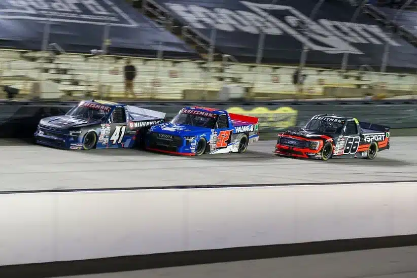 Sep 14, 2023; Bristol, Tennessee, USA; NASCAR Truck Series driver Bayley Currey (41) leads driver Stewart Friesen (52) and driver Conner Jones (66) during the NASCAR Craftsman Truck Series race at Bristol Motor Speedway.
