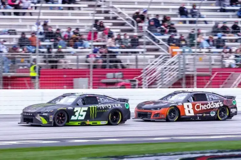 Moran; Feb 23, 2025; Hampton, Georgia, USA; Riley Herbst (35) and Kyle Busch (8) battle for position going into turn one at Atlanta Motor Speedway.