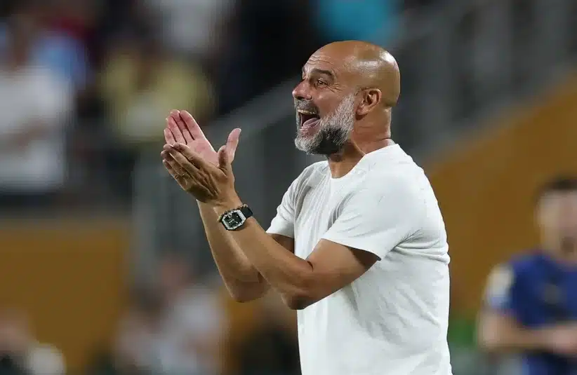 Pep Guardiola clapping his players