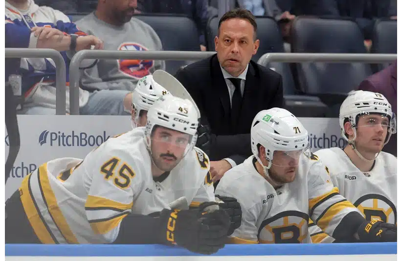Nov 4, 2025; Elmont, New York, USA; Boston Bruins head coach Marco Sturm coaches against the New York Islanders during the second period at UBS Arena. Mandatory Credit: Brad Penner-Imagn Images
