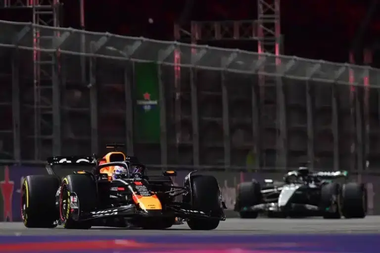 Brundle; Nov 21, 2025; Las Vegas, NV, USA; Red Bull Racing driver Max Verstappen (1) leads Mercedes driver George Russell (63) during the Las Vegas Grand Prix at Las Vegas Strip Circuit.