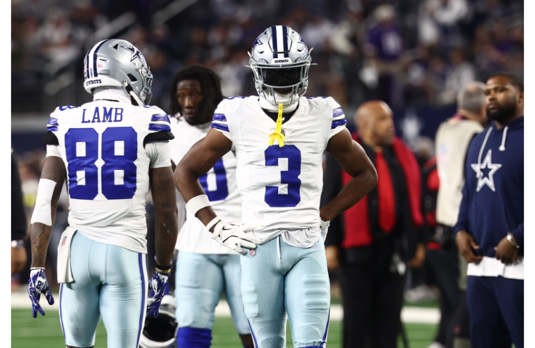 Pickens on sideline celebrating Dallas Cowboys