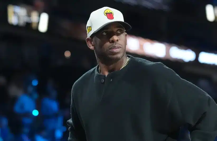 Chris Paul looking at his NBA team