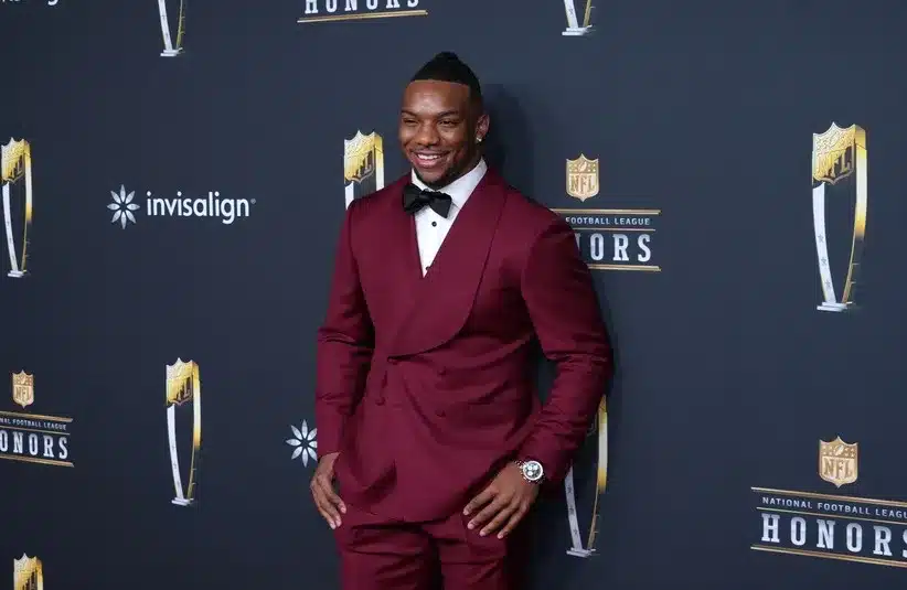 Bijan Robinson poses on the NFL Honors Red Carpet.