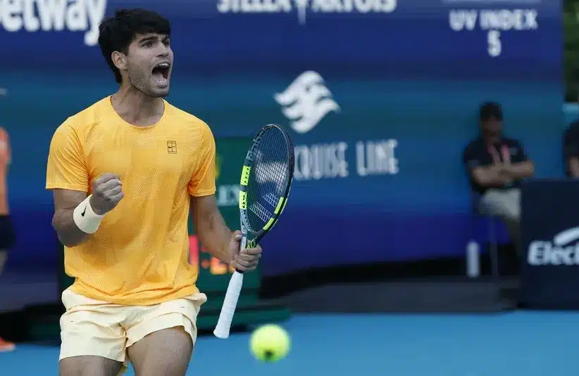 Carlos Alcaraz (ESP) reacts after winning a game.