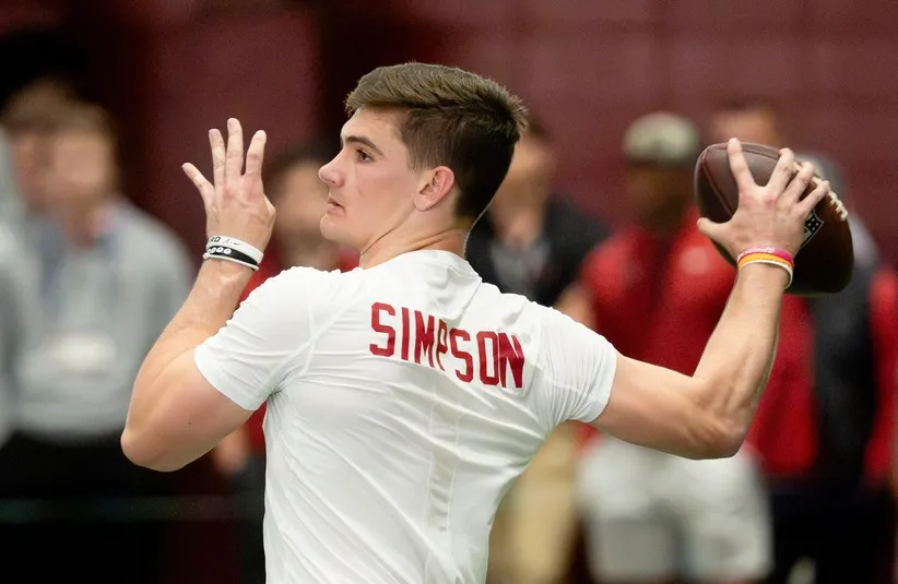 ; Quarterback Ty Simpson throws during Pro Day.