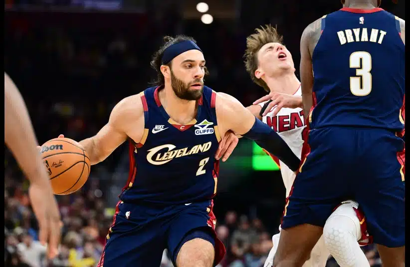 leveland Cavaliers guard Max Strus (2) drives to the basket off the pick of center Thomas Bryant (3) during the second half against the Miami Heat at Rocket Arena