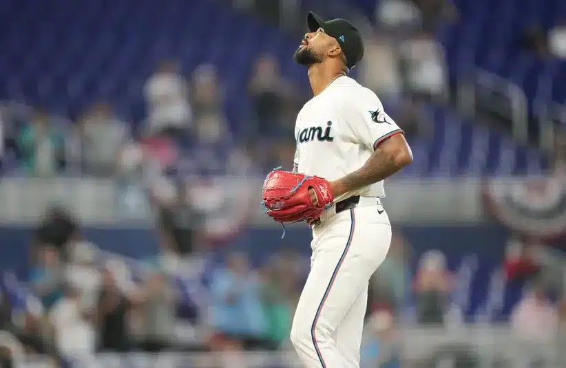 Miami Marlins starting pitcher Sandy Alcantara (22) reacts.