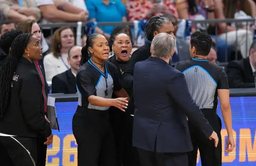 UConn Huskies head coach Geno Auriemma and South Carolina Gamecocks head coach Dawn Staley react in the second half.
