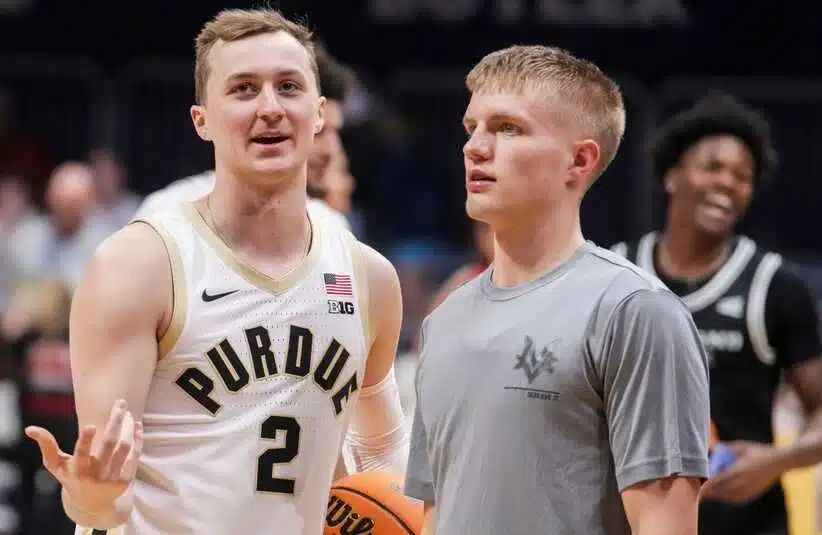 Purdue senior Fletcher Loyer talking to incoming freshman Luke Ertel.